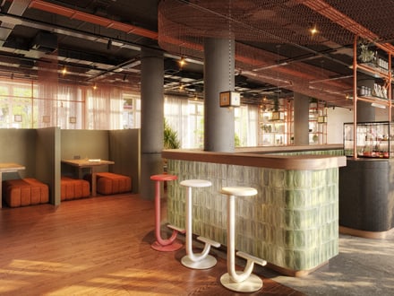 Modernes Café-Interieur mit Bar und Sitzbereichen.