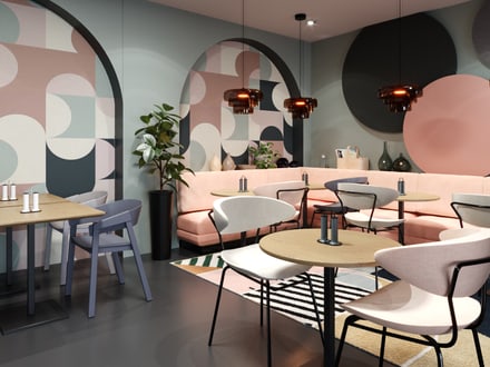 Moderne Café-Einrichtung mit geometrischem Wanddesign, Tischen und Stühlen.