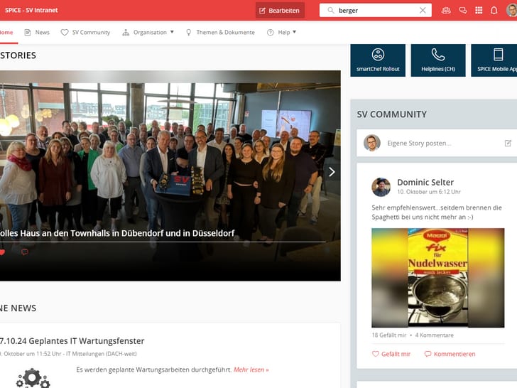 Webseite mit grossen Gruppenfoto in einem Townhall-Meeting in Düsseldorf.