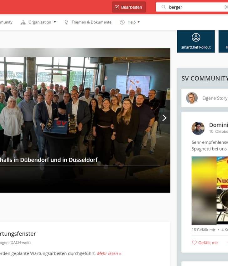 Webseite mit grossen Gruppenfoto in einem Townhall-Meeting in Düsseldorf.