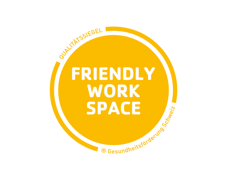 Gelbes Qualitätssiegel 'Friendly Work Space'.
